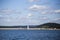 Sailboats on the lake in front of  the water dam