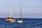 Sailboats navigating in the Sea of Cortez and the Pacific Ocean off the coast of Cabo San Lucas in the state of Baja California