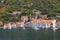 Sailboats near ancient town of Perast on sunny summer day. Montenegro, Bay of Kotor