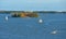 Sailboats near islands of archipelago of Helsinki