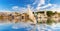 Sailboats on the Nile and traditional buildings of Aswan, Egypt