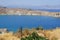 Sailboats and other boats sail the Mediterranean Sea off the coast of Lindos. Rhodes Island, Dodecanese, Greece