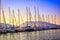 Sailboats in the port at sunset