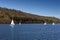 Sailboats racing at a regatta event on Lake Windermere in the Lake District National Park, North West England, UK