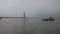 Sailboats returning to Kemah marina.