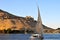 Sailboats sliding on Nile river.