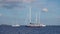 Sailboats, small motor boats and sailing yachts in Mediterranean sea. Lipari Islands, Sicily, Italy