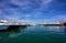 Sailboats and yachts moored to the quay port of Saint-Tropez