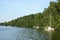 Sailboats yachts moored to shore