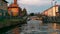 sailing along the Naviglio canal in Milan at sunset