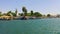 Sailing along the river Dalyan overlooking the boats and ships on the shore. Shooting from the boat to the steadicam