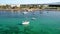 Sailing boat anchoring in the mediterranean sea. Aerial view by drone