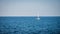 Sailing boat on blue sea with blue sky with white boat alone in karimun jawa