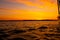 Sailing boat on a calm lake with reflection in the water. Serene scene landscape. Vertical photograph