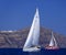 Sailing boat and catamaran in Santorini