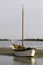 sailing boat in dry, low tide, Adriatic Italy