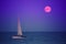 Sailing boat and full moon