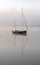 Sailing boat moored on the River Exe at Topsham on a frosty morning