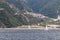 Sailing boat with scenic view on Agiou Pavlou Monastery at Mount Athos, Chalkidiki, Central Macedonia, Greece, Europe.