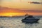 Sailing boat during sunset on the public beach of Albion,Mauritius.