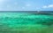 Sailing boat on turquoise mediterranean water in Ibiza island