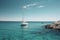 Sailing boat on the turquoise water of the Mediterranean Sea, A small yacht gracefully sailing on the tranquil waters of a