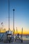 Sailing boat on a wheeled storage rack by the sea