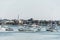 Sailing boats anchored on the Charles River in front of old part of Boston town in Massachusetts USA