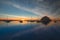 Sailing boats and Morro Rock at sunset