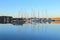 Sailing boats reflected on the water