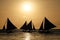 Sailing boats on the sea at the sunset at Boracay