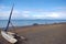 Sailing canoe at ocean beach