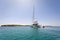 Sailing catamaran moored in a calm bay