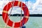 Sailing Concept, view on a Lake through lifebuoy. Summer vacations, cruise, recreation