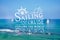 Sailing cruise logo on blurred sea background.