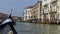 Sailing down the grand canal in gondola Venice Italy