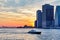 Sailing on the East River overlooking the sunset of Manhattan, New York