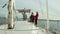 Sailing, female and male sailors working on deck of yacht