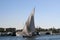 Sailing on the Nile with traditional river sailing ships photographed in daylight