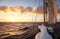 Sailing old schooner at sunset, travel and adventure concept