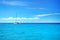 Sailing party catamaran in the blue carribean sea and cloudscape