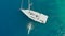 Sailing regatta, boat trip, top view. White yacht in the blue sea