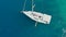 Sailing regatta, boat trip, top view. White yacht in the blue sea