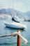 Sailing: sailing rope on wooden dock pier. Sailing boats in the background