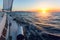 Sailing ship boats in the Sea during amazing sunset.