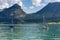 Sailing ships at Austrian Wolfgangsee surrounded by alpine mountains