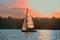 Sailing into the sunset. Sailboats regatta