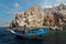 Sailing tourist dhow boat in Oman mountain fjords, Khasab