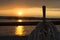 Sailing vessel ropes against sunset