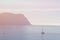 Sailing voyage cruise travel concept of sailboats sail on water in sea with mountain on background with skyline and copy space in